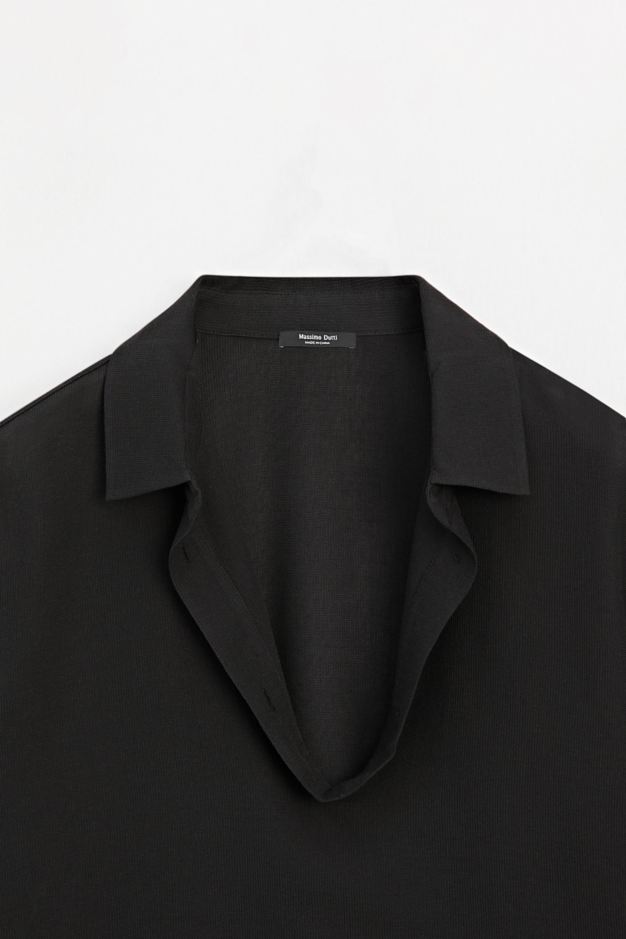 Flowing cotton blend V-neck shirt